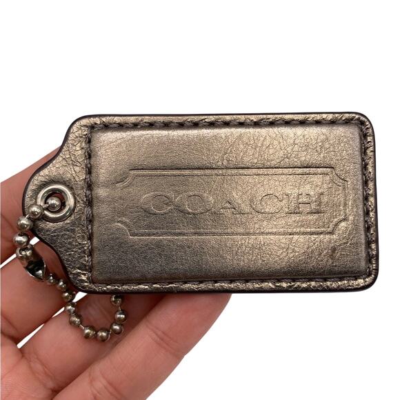 2.5" COACH Bronze Fob Bag Charm Hang tag Hangtag - Picture 1 of 2